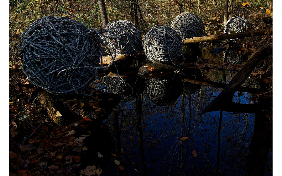 YoudhistirMaharjan(b. 1984, Kathmandu, Nepal); Ananta Shesha;ongoing;9-mile-long hand-twisted reclaimed newspaper rope rolled into balls;courtesy of the artist